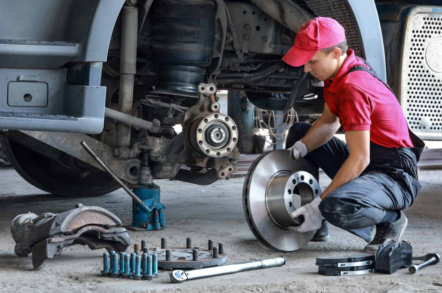 mechanic doing light truck services such us truck services & truck maintenance in Moorooka Automotive